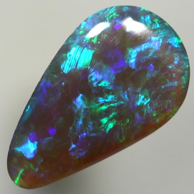 SOLID BLACK CRYSTAL OPAL Sparkles of green and blue 